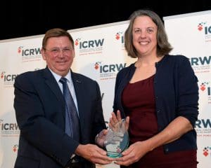 Kate Price receives award from Scott Jackson